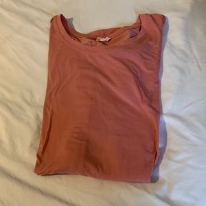 Small pink workout shirt, fits loose